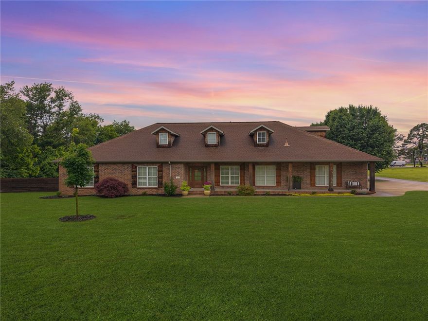 Grandfathered in as residential but surrounded by future commercial growth, this rare property offers unmatched flexibility for living, working, or investing. Situated on nearly an acre with no HOA, this 4-bed, 3 full + 2 half bath home features a private pool, storm shelter, 30-amp RV hookup, and a spacious layout with thoughtful updates, including a 2020 addition. Owned by the same family since it was built, it's been well maintained and offers long-term potential. Zoned residential, but positioned in an area with increasing commercial activity—giving future owners the option to explore rezoning or business use (buyer to verify). Conveniently located with easy access to major employers like J.B. Hunt, the Tyson HQ corridor, and the future Walmart campus, plus a straight shot to I-49 for quick commuting across NWA. Now offering $5,000 in lender credits with The Hauth Mortgage Team. Live in it, invest in it, or build your future here.