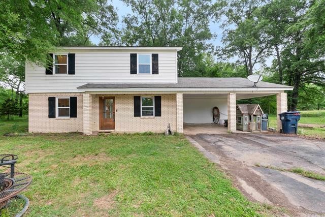 SOLD OUTSIDE OF MLS.
4 bedroom 2 bath Farmhouse style home on 20.25 acres! This home features LVP flooring, wood tile flooring, carpet, newer windows, updated bathrooms, granite counters, & stainless steel appliances! Through the kitchen you'll find a massive butler pantry. Spacious living room and dining room offers a great space to entertain. Primary bedroom and bath downstairs with 3 bedrooms, bath, and large storage closet upstairs. (sellers currently using downstairs bedroom as guest room) 24x28 shop and a fenced in backyard. This place is the perfect spot for anyone who wants country living and farm life. Pigs, chickens, goats are all welcome! Pond on the property! All appliances will convey except deep freezer.