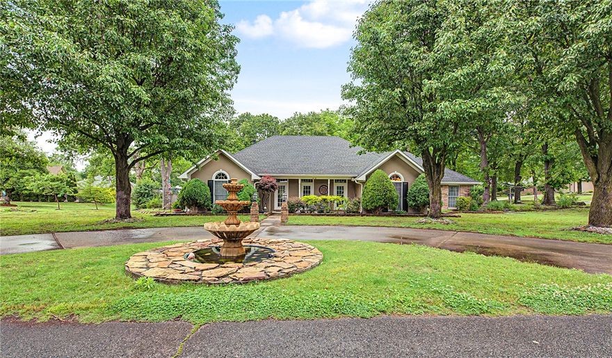Beautiful home on a highly desired .47-acre lot in North Bentonville's Hidden Springs subdivision with a heated saltwater pool, ideally located between DWTN Bentonville & the N. Bentonville trail system, and just minutes from the new OZ Trails Bike Park. Enjoy quick access to the Razorback Greenway and mountain biking trails right outside the subdivision. This home offers standout curb appeal with a stucco exterior, beautiful landscaping, a tranquil koi pond, & a stunning 3 tier fountain. Inside, the living room features a cathedral ceiling. You’ll also find a spacious eat-in kitchen with dbl ovens, a large sunroom filled with natural light, & a cozy gas fireplace perfect for relaxing or entertaining. Recent updates include a new roof, new fence, new retaining wall, new gutters with lifetime-guaranteed gutter guards, and a new pool liner on the way. This is a rare opportunity to enjoy an unbeatable lifestyle location in one of Bentonville’s most sought-after areas. This home is ready to make your own!