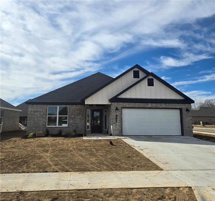 Introducing the beautifully designed Marjorie Plan — a thoughtfully crafted one-level new construction home offering 4 bedrooms, 2 bathrooms, and a seamless open-concept layout for modern living. The spacious living area features a stunning fireplace with floating shelves, creating a warm focal point. The kitchen is equally impressive with abundant cabinetry, a large island with 3 cm quartz countertops, pendant lighting, and a Frigidaire Gallery appliance package — perfect for entertaining and everyday functionality. Durable yet comfortable finishes include LVP, carpet, and tile flooring, along with LED disk lighting, a smart thermostat, and keyless entry. The exterior showcases brick and Hardie siding, full aluminum guttering, and a covered back patio overlooking a generous backyard — ideal for relaxing or hosting gatherings. Conveniently located near schools, shopping, dining, and more. Builder preferred lender credit available.