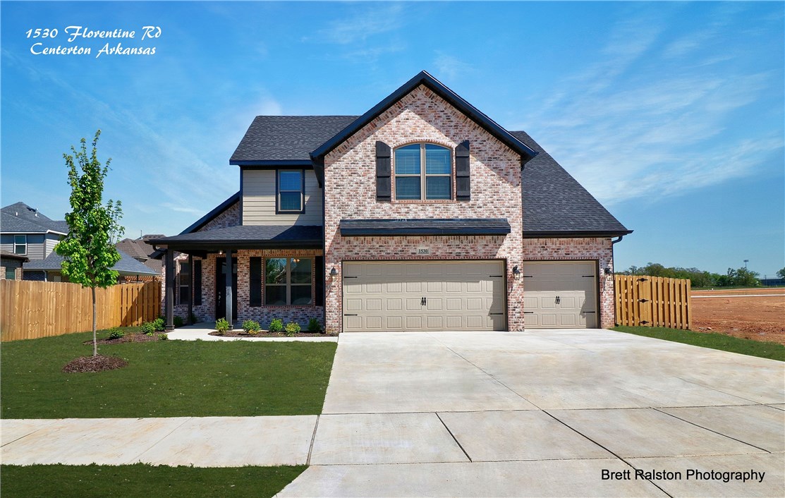 Gorgeous home featuring custom finishes, Fantastic plan w/ large kitchen cabinet space featuring , built-in appliances, and beams. Other amenities include:quartz countertops, formal dining room, custom cabinets w/ vented hood, under cabinet lighting, gas cooktop, full gutters, irrigation in front, full privacy fence, and 3-car garage. Located within walking distance to Bentonville West High School. clubhouse, pool, fishing pond with water features.
