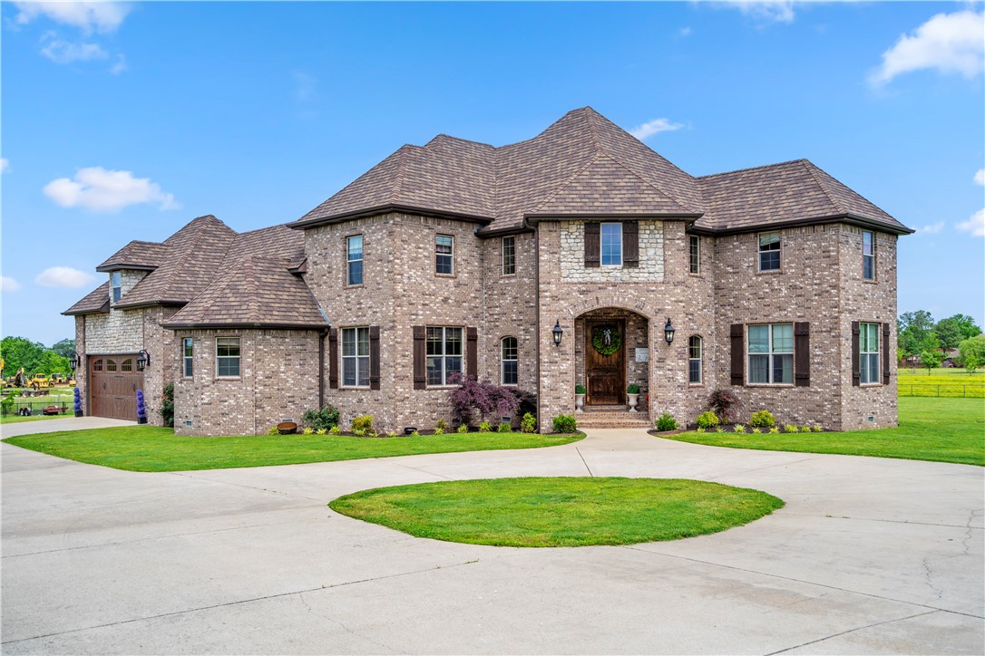Welcome to your dream home, situated on 5 beautifully maintained acres in a rapidly growing area, offering the perfect blend of comfort and functionality! Step inside the main home and you'll find generous living spaces, a fully equipped home theater for movie nights, and ample bedrooms to accommodate the whole family. Storage will never be a concern with extensive built-in solutions throughout the home—thoughtfully designed to keep everything organized and within reach .Outdoors, enjoy your own private oasis with an in-ground pool—ideal for relaxing or entertaining. The property also includes a separate, fully finished shop, complete with its own kitchen and bathroom, making it a versatile space for hobbies, guests, or even a private office. Animal lovers will appreciate the dedicated dog run and horse barn, offering comfortable accommodations for your four-legged family members. With room to roam and grow, this property is a rare find that combines country charm with modern convenience!