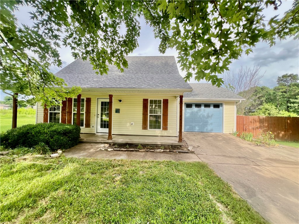 This 3beds, 2baths two-story home is great for a starter or rental property and it's ready to move in. The property is located within walking distance to Tyson Foods, a Grocery store, and the Green Forest School district. About 45 Mins to Branson, an hour to Fayetteville, Springdale, Bentonville, and Roger. Hardwood floor in the living room and ceramic tile in the bathroom and the kitchen. Wood laminate in the 2 bedrooms and carpet in the additional bedroom. Metal storage is in the side yard and is conveys with the property. Roof and water heater replaced in 2023. The property is fully fenced, so less worry about space for your fur babies. Don't wait. Call today for a showing!