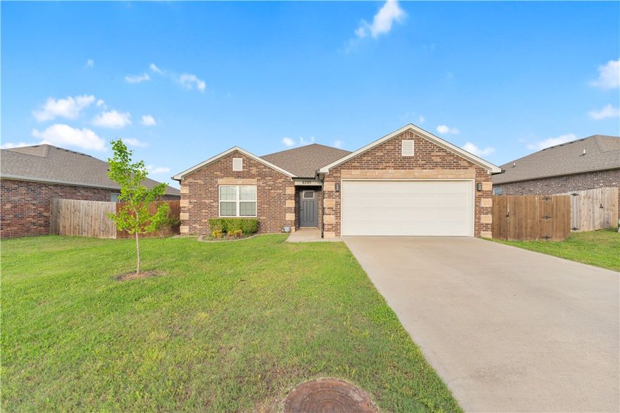 Beautiful all-brick home located in the highly desirable Providence Village subdivision in Bentonville! This well-maintained 3-bedroom, 2-bath home offers a modern open floor plan with crown molding details that add a touch of elegance throughout the main living areas. 

The home features granite countertops, energy-efficient appliances, and generously sized bedrooms designed for comfort. Step outside to enjoy a covered back porch overlooking a large backyard with a privacy fence—ideal for relaxing, entertaining, or enjoying outdoor time in peace.

Additional highlights include a 2-car attached garage, landscaped lot, and a prime location close to schools, shopping, and everything Bentonville has to offer. This home combines style, functionality, and location—making it a fantastic opportunity.