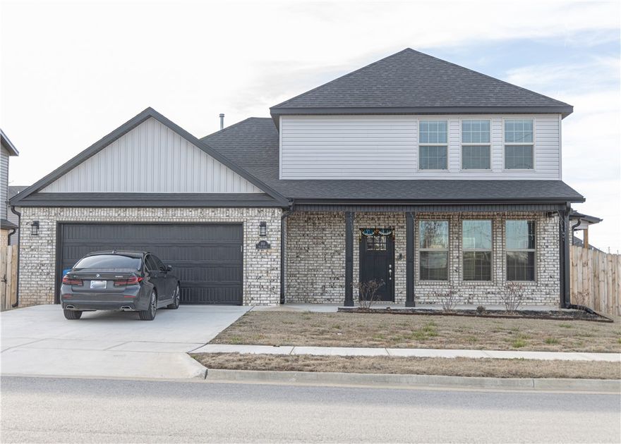 Discover the enchanting features of this delightful four-bedroom, two-and-a-half-bath residence, perfectly located in the heart of Centerton! This east-facing home, set on a corner lot, offers modern conveniences, including a Nest thermostat, Ring doorbell, and much more.  The well-equipped kitchen beckons you to enjoy meals in its lovely eat-in area, filled with natural light. The garage, featuring epoxy flooring, adds a practical touch, while the designer lighting and built-ins in the living room bring stylish functionality. For your convenience, a washer, dryer, and refrigerator are included.  Step into the fenced yard, enhanced with solar lighting, blinds, and gutters. Relax on the spacious and inviting front porch, or retreat to the covered back patio—both ideal spots for unwinding.