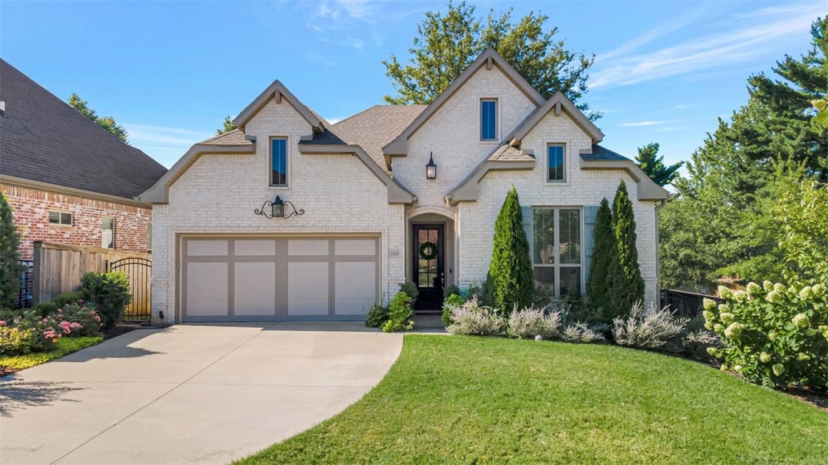 This very well-kept and well-manicured property in a highly desirable neighborhood will be sure to please. Conveniently located near Root School, with easy access to trails, U of A, the Downtown Square, and Dickson, this one-level home includes 3 bedrooms and 2 bathrooms. The white kitchen opens into the stunning living and dining area with vaulted ceilings. High ceilings throughout the home feel grand, light and open. The large main bedroom flows into the equally spacious bathroom and closet. Relax on the covered back patio with outdoor speakers, surrounded by trees for privacy, or venture out and enjoy the conveniences of this location. HOA handles all lawn-care and landscape.