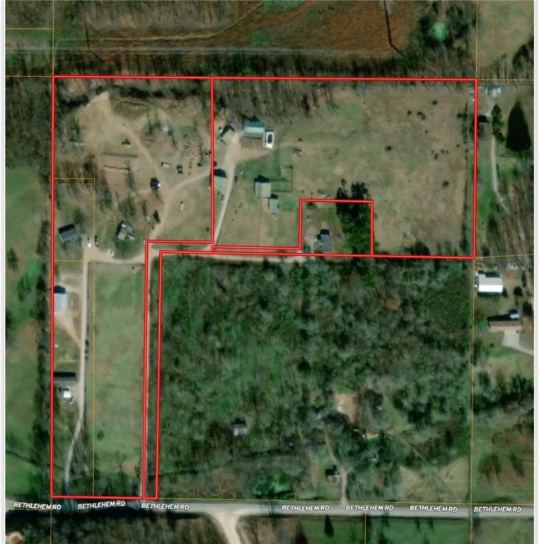 This income producing deal is for you!!! Wonderful multiple home package with opportunity to develop! 5 homes with outbuildings. 40x50 shop & 24x30 barn with a 12x30 lean to on each side & 28x40 barn & 30x40 shop building with a 12x40 lean to on the side included with property. Family tenants at this time but could produce $6,900 per month potentially. Current utilities present include Carroll Electric & Centerton water, currently annexed into Centerton developments are starting soon on adjoining properties. Part of property is expected to have sewer soon, buyer to satisfy themselves on utilities! No deed restrictions! Don't wait, there are homes on the property, minimal value or consideration being provided to residents. However, they are in great condition & being lived in. Could also potentially be perfect for a mini hobby farm. The opportunities are endless! Animals live here- please do not enter without an appointment- seller must make arrangements. Appointment Only! Photos on request! More photos coming soon.