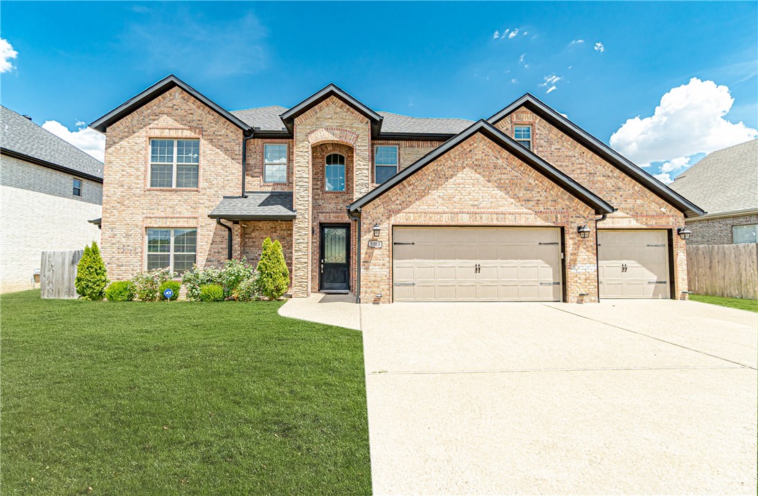 Show stopping, custom home in the highly sought after Central Park subdivision. This open concept 5 bed, 4 bath home offers towering ceilings, an abundance of natural light, and beautiful wood floors throughout the living areas and master suite. Enjoy cooking in your dream kitchen complete with gas cooktop, instant hot water, 2 sinks, granite countertops, and large island. Relax in the master suite complete with an ensuite bathroom featuring double vanity, soaking tub, tiled shower, and a roomy walk in closet. Spend evenings in your media room complete with projector and bar with wine racks and mini fridge. Entertain guests from your oversized covered patio in your spacious, fenced yard. Additional amenities include wide doorways throughout and sound wiring. Just minutes from Downtown Bentonville, the Walmart Amp, Pinnacle Hills Promenade, and local schools, this home could not be in a better location! Welcome to your dream home! 2% of sales price paid by seller for rate reduction and/or lender approved expenses.