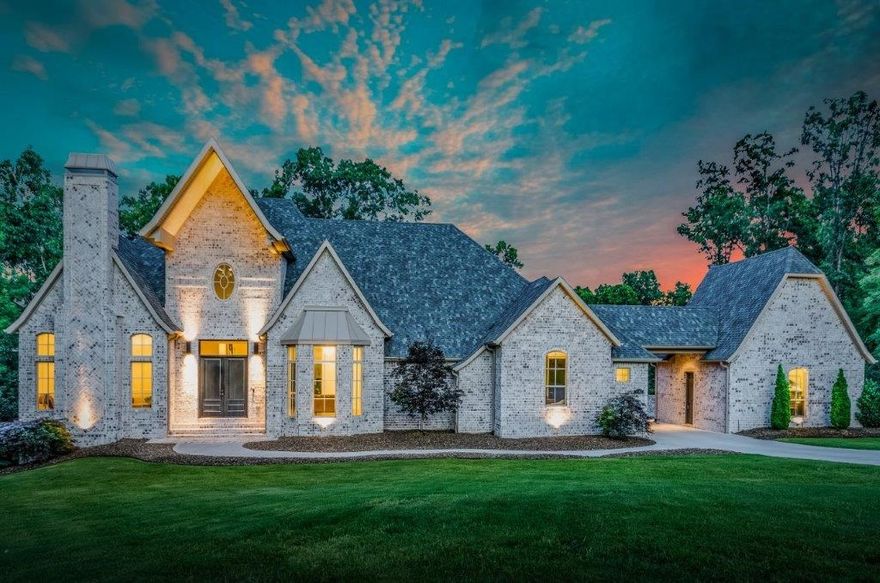 Meticulous, three year old custom contemporary traditional in private cul de sac (1.77 acre lot) is an entertainer's delight. Features large kitchen, custom cabinets, 6 burner gas stove, walk in pantry & covered deck w/gas grill, flush mount gas heaters & fireplace. Main floor offers 12 ft ceilings. Wide plank white oak floors throughout. Master has 12 ft ceiling, showcase bathroom & his / her walk-in closets. Two options for inlaw suite. Walk out basement w/10 ft ceilings. Desirable location to Walmart Home Office makes for easy commute. Oversized laundry & mud room w/custom cabinets. Private yard w/four car garage or shop option.