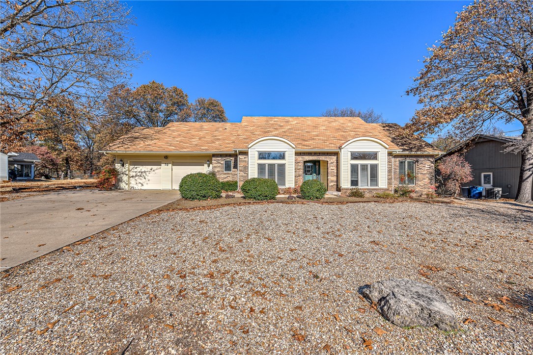 Golfer's paradise! This beautiful one level, ranch style home is located on the #10 green of Highlands Golf Course. Enjoy all 4 seasons in the 24X20 enclosed sunroom overlooking the golf course. There is a separate entrance and additional space to park your golf cart in the garage. Low maintenance is the key to both this home and the professionally landscaped yard.