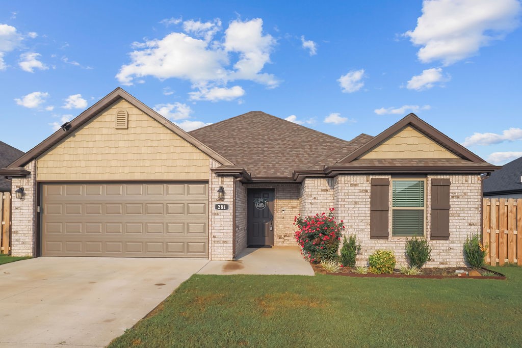 Discover modern comfort in the heart of Farmington at 281 West Tyler Road! This beautiful 2023-built, all-brick home features three bedrooms, two bathrooms, and premium finishes throughout. The open living space showcases a freestanding brick fireplace with gas logs, while the kitchen boasts 3cm granite countertops and stylish backsplash. The spacious primary bedroom offers added lighting, walk-in closet and primary bathroom with granite vanity. Highlights include tankless water heater, faux wood blinds that convey, gutters, and a two-car garage with 24' bay perfect for a smaller boat. The fully-fenced backyard features an extended concrete patio. Conveniently located less than 1 mile to Walmart Neighborhood Market and 2.4 miles to Creekside Park!