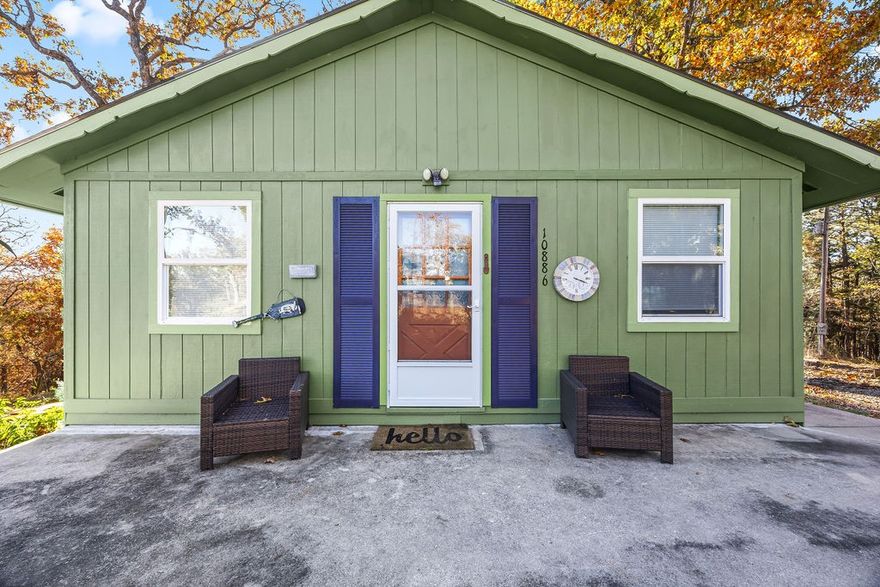 Super cute cabin/cottage sitting on 2 acres, walkable to public opening to Ventris Cove on Beaver Lake! Remodeled 3BR/1BA with unfinished basement. Completely repainted in 2024. New gutter. New carpet throughout. Newer stainless steel kitchen appliances. Central heat and wood burning stove perfect for a cozy winter retreat. Separate workshop, potting shed, and carport/storage. This beautiful property is in a fantastic location, just 35 minutes from downtown Bentonville or Rogers. *Refrigerator conveys. AC window units convey. Note there is also a mini-split system in the closet that will convey and could be installed.*