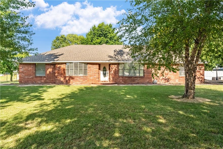 Beautiful Setting! Seems like you're in the country, but you're right in the middle of town. Located close to schools and shopping. This is an extremely well-built home. It's a 2,703 sqft 3bdrm 3bth home with a 40X60 metal insulated shop and a 60X40 metal barn, all on 3.56 acres! Home was constructed in 1992 and is now ready for a new family and maybe some freshening up! It is perfectly located and family and animal friendly! Come take a look. Well qualified buyers only. There is also an option to purchase the 11.96 adjoining acres as well! MLS#1256879