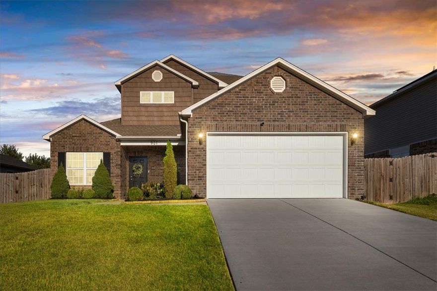 $4,200 Lender credit! Located less than 6 miles from the Walmart Headquarters, this beautifully maintained two-story home is completely turnkey and ready for its next owner! Featuring 3 bedrooms and 2.5 bathrooms, this home offers a functional and inviting layout perfect for modern living. Step outside to a large, level, fenced-in backyard, providing plenty of space for pets, entertaining, or simply unwinding in privacy.  Bonus Hot Tub to convey with purchase. Come see this well-kept, and move-in-ready home delivering both convenience and lifestyle in one exceptional package.