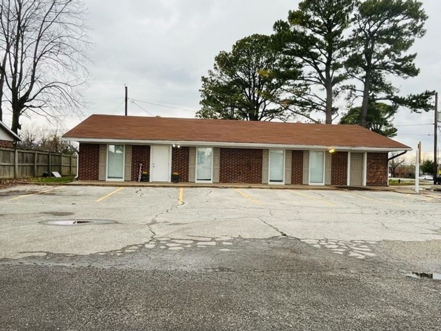 If you're looking for a great location close to I-49 and all the amenities that come with it, this property might be the perfect one for you. Located near I-49, restaurants, gas stations, and Walmart, this building is clean and very well kept. With plenty of parking space, new paint, new carpet, new flooring—perfect for a daycare or small business office space! It has two small offices and a kitchenette as well as 2 bathrooms and a spare room. New Roof 10/2024 Property to be "sold as is."