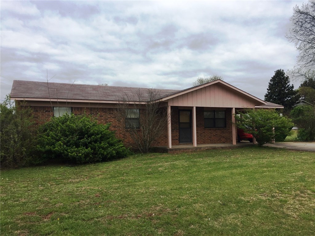 Well maintained 3 bedroom, 1.5 bath, brick home on large corner lot. Detached shop/garage. Conveniently located across from Madison County Library and the Senior Center.