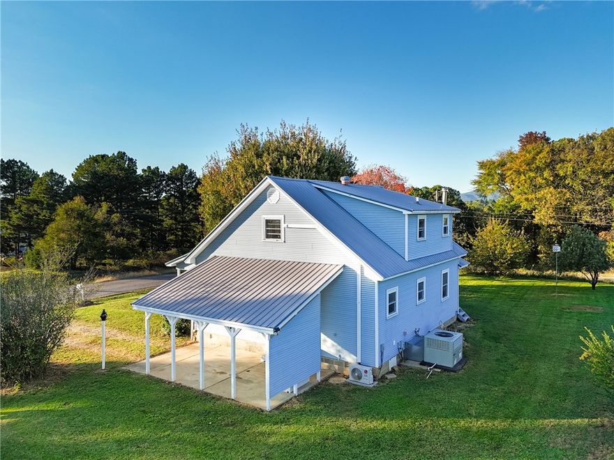 A true horse lover’s dream just minutes from town!  This peaceful 3 bedroom, 2 bath home sits on 20 rolling acres with a pond, well-maintained hay fields, and 15 acres of fenced pasture plus 5 wooded acres.  Equestrians will love the 180x70 sand arena and 60x40 barn featuring five 10x12 matted stalls, each with its own matted run-in. The barn also includes a tack room and electric, with 1,100 ft of pipe fencing connecting the barn and pastures for easy turnout.  A small workshop with concrete floor, electric, and a 30 amp RV hookup offers space for equipment or guests. Every detail of this property has been designed with horses and peaceful country living in mind offering serenity, space, and convenience just outside the city limits.
