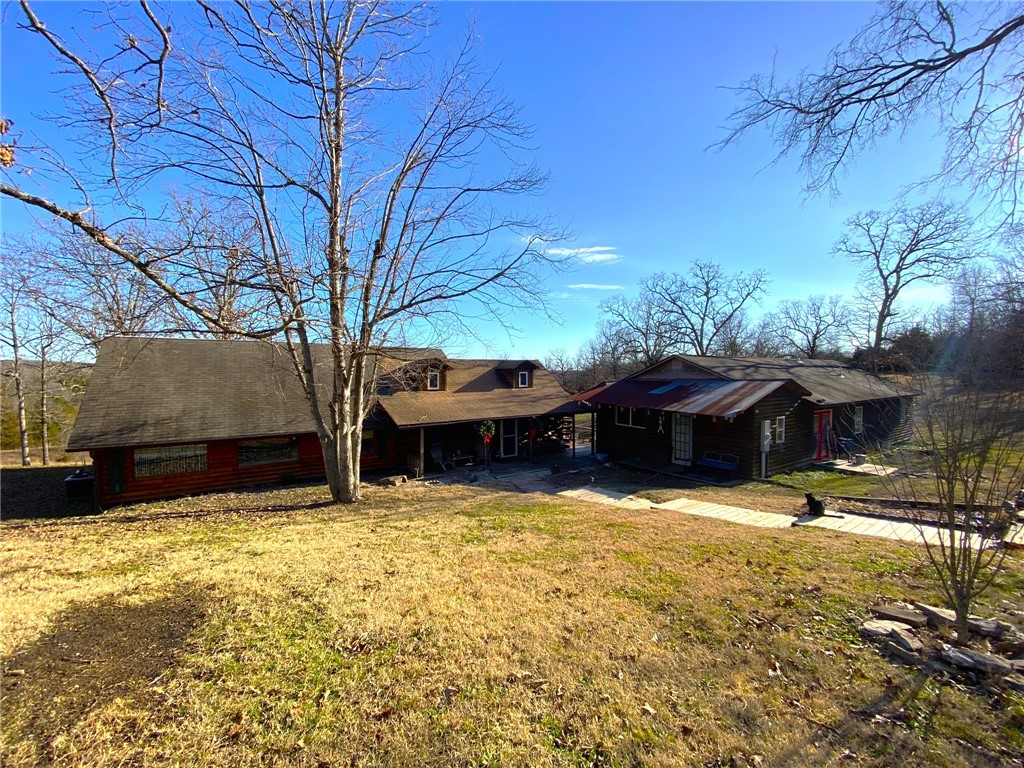 Nestled on 15 ac/ml, this beautiful real estate gem offers not just one, but two spacious 1500+ square-foot houses. Each house boasts ample living space, providing comfort and flexibility for your family and guests. The property features a picturesque pond, beautiful country views from the open deck, cleared pasture, perfect for peaceful moments of reflection, raising farm animals, or recreational activities, Additionally, a 30 x 60shop building equipped with a car lift, offering endless possibilities for storage, hobbies, or even a home-based business. Whether you're a car enthusiast, a woodworking aficionado, or simply in need of extra workspace, this shop building will cater to your needs. Imagine waking up to the gentle sounds of nature, enjoying the privacy that 15 acres of land provides, and having the convenience of a dedicated workspace right on your property. This private & secluded real estate opportunity is truly one of a kind.