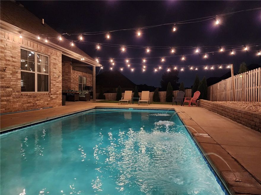 Upgraded 4-bedroom home with a low-maintenance saltwater pool in sought-after neighborhood!  This 4-bedroom, 2 full & 2 half baths home with a 3-car garage sits on a spacious corner lot.  Enjoy an open-concept layout with wood-look tile flooring & a split-bedroom design.  The custom kitchen offers premium finishes, a large island with quartz countertop, honed granite surfaces, and a walk-in pantry.  Upstairs, a versatile bonus room with half bath is perfect for movie nights or a home office.  Upgrades include soffit electrical outlets for holiday lighting & and oversized garage with extra storage. Built-in 80gal air compressor installed in ’23 w/50’ hose reel in garage.  Also, a 50 amp 220 volt circuit EV charging outlet.  Relax or entertain in your private backyard oasis featuring a saltwater pool with fountains, string lights, & a spacious patio. The fully fenced yard adds privacy & charm.  This home has it all…style, functionality, & the perfect space for lasting memories. New carpets installed on 5/28.