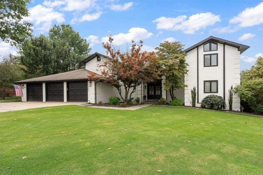 BEAUTIFUL ESTATE HOME ON A LARGE .45 ACRE LOT WITH DIRECT ACCESS TO COLER MOUNTAIN BIKE PRESERVE AND ONLY 5 MINUTES TO DOWNTOWN BENTONVILLE! This home features an IN-GROUND POOL, WiFi controlled irrigation, real hardwood floors, and a spacious living room with a stunning brick fireplace. The kitchen includes 3 cm granite counters, substantial cabinet space, and an abundance of natural light. The second living area is perfect for entertaining with a flex room currently being used as an office. Enjoy a cozy movie room (projector and screen convey) and a fully remodeled primary bath with an oversized custom-tiled shower featuring Wifi electronic controls, heated floors, dual vanities, and a soaking tub. Step outside and relax by the expansive deck, covered hot tub, or salt water pool. Seller will give a $10,000 credit at closing for buyer to remove popcorn ceiling.