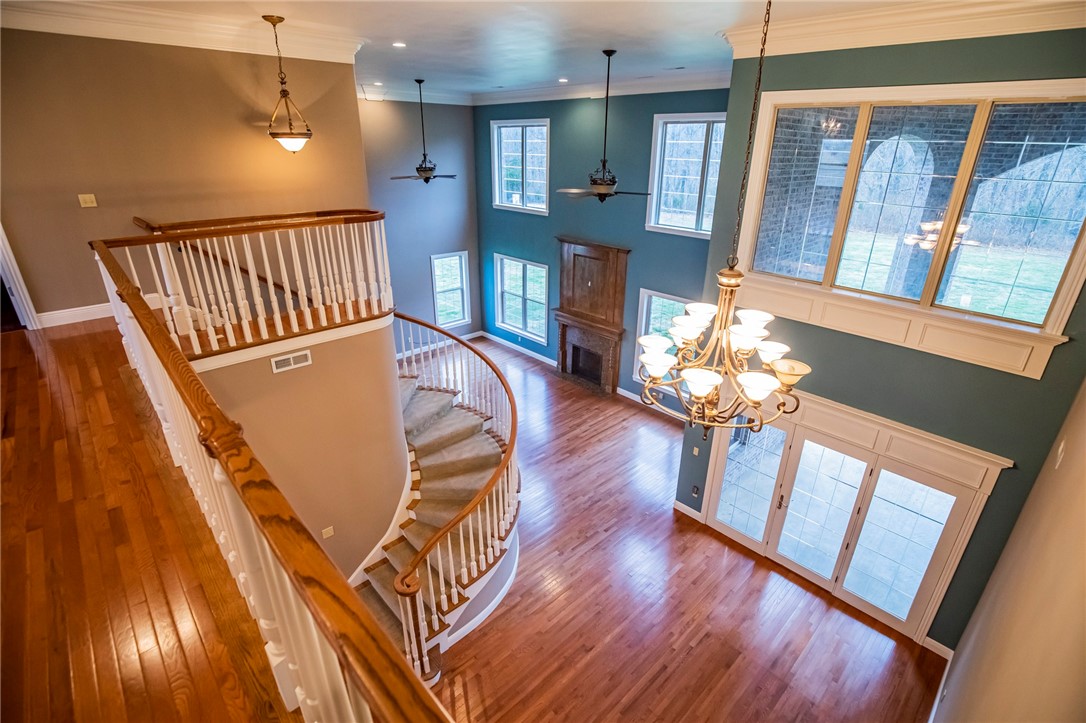 Very Spacious 2 story home nestled on a large lot in the beautiful Meadows subdivision in Little Flock. This mostly all brick home has 5 bedrooms which consists of a master suite with sitting area downstairs and upstairs. The main level master suite also comes with its own private fireplace. This home has upgraded stainless appliances featuring a gas cooktop with custom stainless vent hood. The living and family room have soaring ceilings that feature abundant windows with etched glass grids allowing picture esq views of the wooded backyard. The master bathrooms have large walk in showers and jetted tubs along with ample storage and counter space. The guest bath downstairs has been remodeled recently and has on oversized shower head and a beautiful custom sliding shower door. This home also features and large dining room, covered patio, pantry, oversized garage, spiral staircase, theater room, and much more.