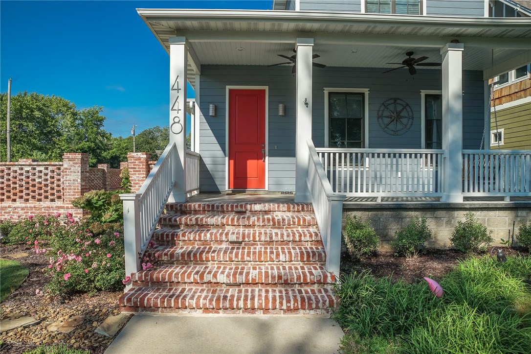 Walk to anything in downtown Bentonville! This gorgeous home on a corner lot is perfect for anyone interested in downtown living! Features an open floor plan, stained concrete floors, a huge walk-in closet in the master bedroom, and an adorable fenced side yard, complete with an outdoor kitchen, fire pit, and screened patio. This is the perfect home to entertain friends and family and is only two blocks from the new Starlight Cinema, the Walmart home office, and a vast array of delicious restaurants.