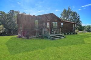 If Mill Creek is where you want to be we have the home for you. Would you would love to be at the end of the road on 1.5 acres? Would you like to have a shop? Would you adore granite counter tops with an open floor plan. Would a log cabin look on the outside be for you? If the answers to these questions are yes then wait not more. Your new home awaits.