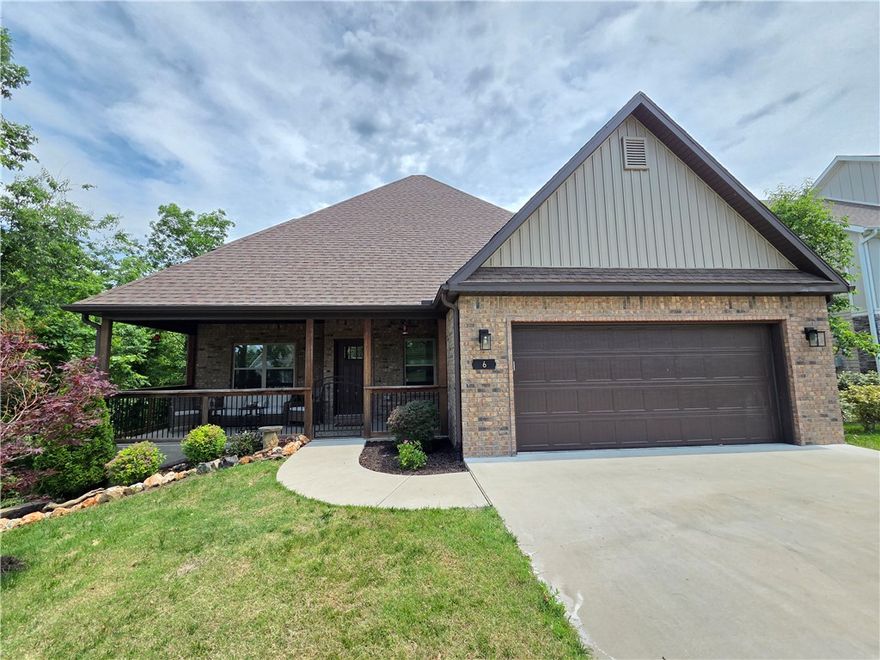 Envision your future in this exquisite residence, boasting an expansive private front porch, complemented by a custom wrought iron fence, providing a serene retreat. The interior showcases bright living spaces with recent updates, including fresh paint, LVP flooring on the main level, and new carpeting upstairs. A stunning stone gas log fireplace serves as a focal point, while the functional kitchen features soft-close cabinetry, granite countertops, an island, under-cabinet lighting, a gas cooktop, stainless steel appliances and ample storage. The master suite offers a spacious walk-in shower, dual vanity, soaking tub, and generous walk-in closet. Three generously sized bedrooms with walk-in closets and a full bath are situated on the upper level. Additional amenities include dual Ecobee thermostats, a back deck with an electric Sunsetter awning, a heated oversized garage with a drop-down workbench, storage throughout the home and in the large crawlspace, and a beautifully landscaped yard on a cul-de-sac street.
