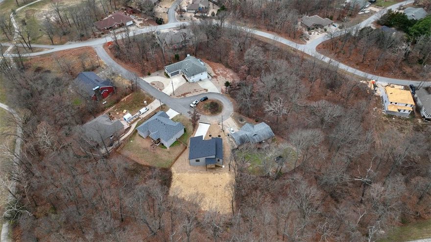 Beautiful contemporary new construction 3-bed, 2-bath home features an eat-in kitchen with waterfall island, one-piece backsplash, electric range, and walk-in pantry. No carpet—just tile and premium LVP throughout. Built with Zip System sheathing and Solar Board roof decking to keep the home energy-efficient and the attic up to 40° cooler in Summer. Windows are an upgrade over basic Builder windows. Upgraded front door. Wind and rain underlayment under 3D architectural shingles. A must see!!