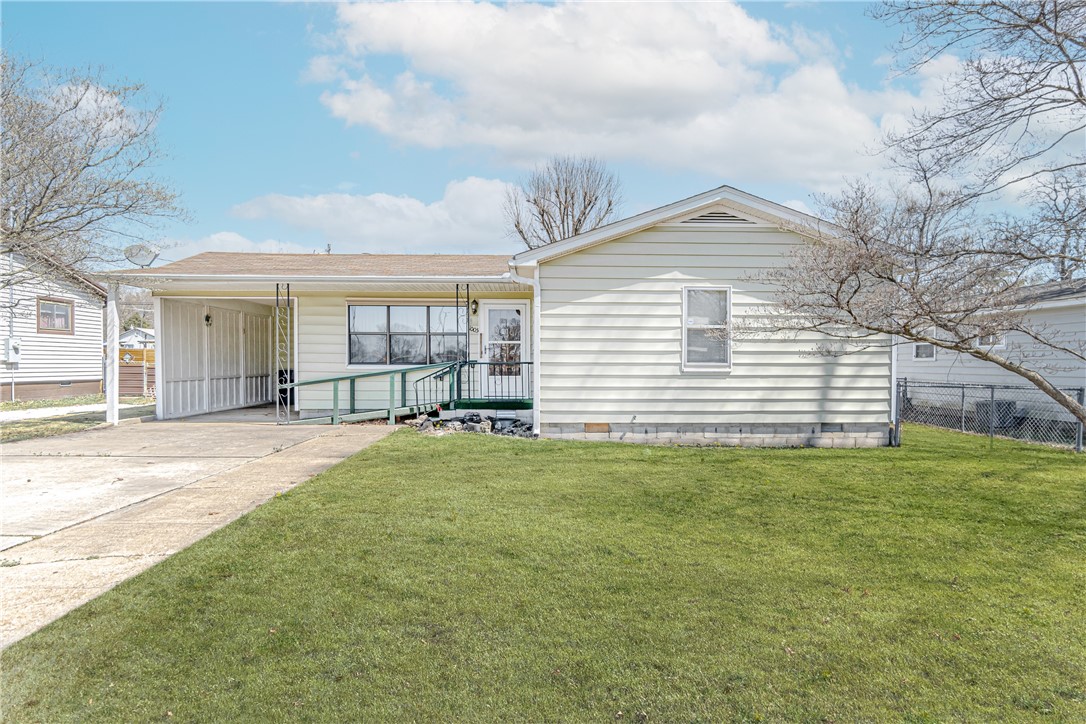 Classic home in Rogers. Kitchen has beautiful wood cabinets, bar style pulls, white subway tile and lots of counter space! Washer and dryer included. Large, backyard! Apply now!