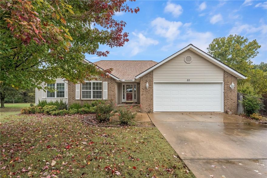 Fall in love with this beautifully maintained 3-bed, 2-bath Bella Vista home on a mostly level ½-acre lot with a fenced side yard. This home is already on sewer and updates include a new roof (2025) and HVAC (2019).  Washer, dryer, and refrigerator to convey.  Enjoy bamboo flooring, a vented propane gas fireplace with blower, and a bright living space with new sliding doors. Relax on the large, elevated deckāboth covered and openāoverlooking a spacious tree-lined backyard. The unfinished partial basement includes a workshop area with additional storage under the deck, so your attached two car garage has room for your cars.  Minutes from biking and walking trails and the Metfield Golf complex with golf, park, pool, and fitness center.  Put this house on the top of your list.