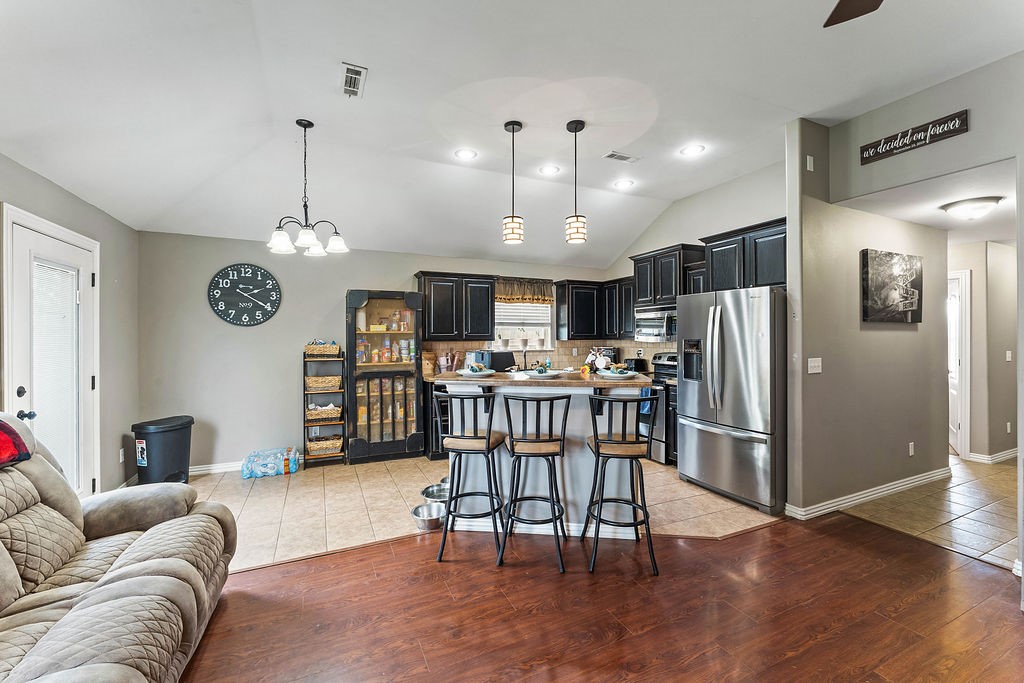 Welcome to this Adorable 3 Bedroom, 2 Bath Turn-Key Home in the Heart of Gentry!
Step inside to an open living area with a cozy fireplace for winter nights, seamlessly flowing into the kitchen and dining space. The split floorplan offers two charming guest bedrooms off the entry, while the primary suite rests privately on the opposite side.
The primary bedroom features a stylish shiplap accent wall, ample space to unwind, and a roomy en-suite with dual vanities. Step out back to your private patio and large fenced yard—perfect for BBQs, entertaining, or relaxing evenings.
Additional highlights include a 2-car garage, corner lot location, in an established neighborhood with close proximity to schools and parks.
Priced to sell—this one won’t last long!