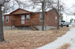 Beautiful cabin nestled in the Ozark Mountains. This cozy 2 Bed 1 Bath home makes the perfect get-away! Located only minutes from the Buffalo River and Forest, but close to town. A home that must be seen appreciate.