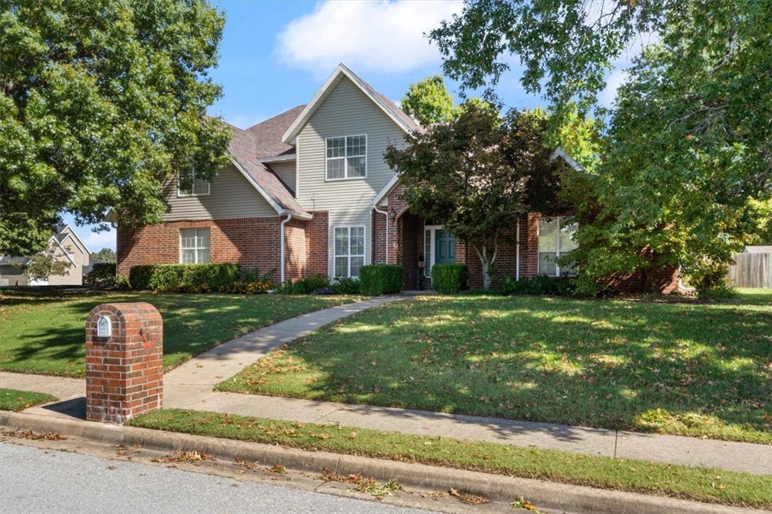 Exquisite family home nestled in highly sought-after Southwind Terrace neighborhood. This stunning 3BR/3.5BA offers the perfect blend of timeless elegance & modern comfort. Greeted by the grandeur of cathedral ceilings adding a touch of luxury to this 2842SF well-designed living space with dbl-sided fireplace & hearth room to enjoy cozy evenings with family/friends. Each bedroom offers a wlk-in closet & ensuite bathroom to ensure comfort & privacy for everyone. One bedroom even has a bonus room, perfect for office/playroom. Chef's dream kitchen with granite counters, center island, stainless appliances and pantry for all culinary needs. Discover a well-manicured lawn with rock patio perfect for entertaining and relaxation, two outbuildings, sprinkler sys & landscaping that adds to the overall charm & curb appeal. Conveniently located to I-49 for easy access to all of NWA. Priced with $10,000 buyer concessions to cover closing costs/rate-buy down so you can call this gem your own.