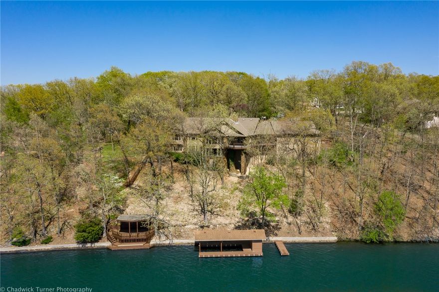 Welcome to your new Lake Loch Lomond dream home! With 389’ of lakeshore on Bella Vista’s largest lake, this home is the ideal location for boating, fishing, skiing, or swimming. Protect your toys under your own covered boat dock then relax & enjoy a one-of-a-kind sunset view from the covered waterfront deck. The beauty of the Ozarks surrounds you on 1.44 private acres while the spaciousness of this recently updated & well-maintained home has plenty of room for your family & is perfect for entertaining your friends. The Northwest Arkansas metro-area has ranked in the top 5 ‘Best Places to Live’ in the U.S.A. each of the last 4 years and Bella Vista takes full advantage of its home in the Ozark Mountains.  Currently boasting 50 miles of hiking & biking trails, Bella Vista will double that in 2020. Bella Vista is also home to six meticulously maintained golf courses.
The summer is coming! Don’t miss the opportunity to own a great lakefront home in a vibrant community!