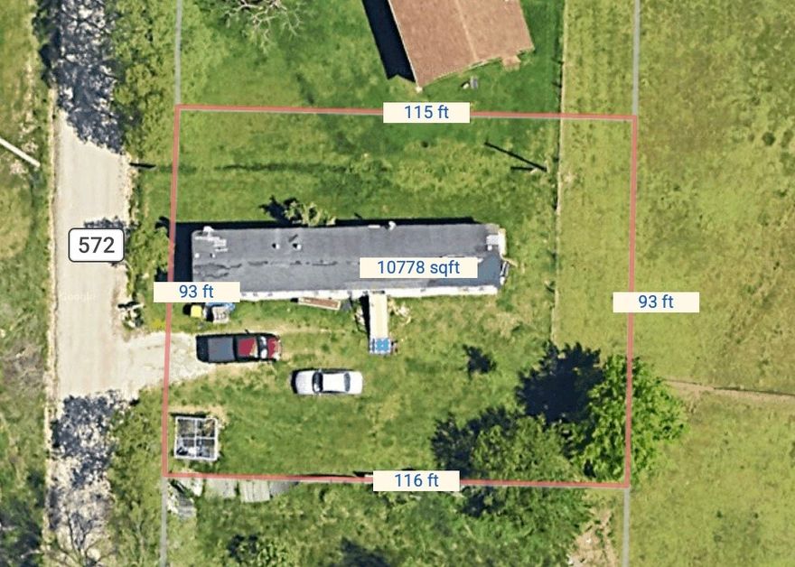 This .22-acre lot is located outside city limits with water and electric available. Property currently has a mobile home in poor condition. Selling land only. Existing septic system was previously in use; condition unknown. Great opportunity for new construction, manufactured home placement, or investment. No city restrictions—enjoy country living with convenient access to nearby amenities.