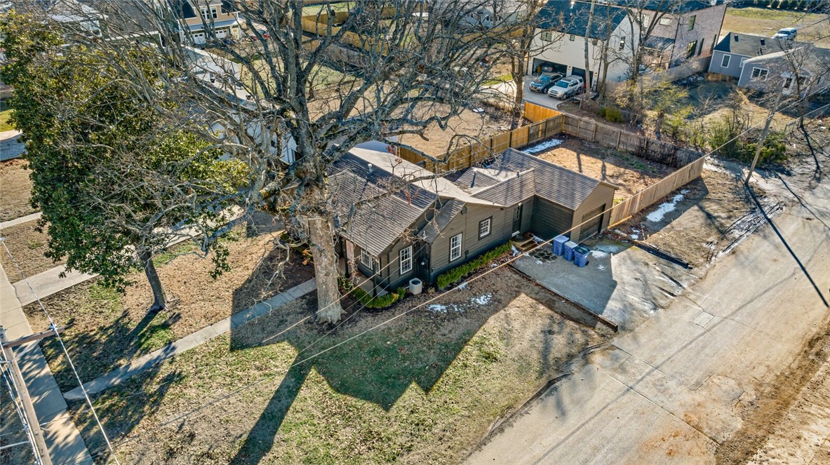 Premium location in downtown Bentonville- just seven blocks from the Bentonville Square and all the amenities downtown has to offer! The property at 815 NW A Street is also available. Together, these two properties present a fantastic opportunity for redevelopment under DN2 or DN3 designations. This property features alleyway access, enhancing its potential for your redevelopment project. With great possibilities in an excellent location, you won't want to miss out!