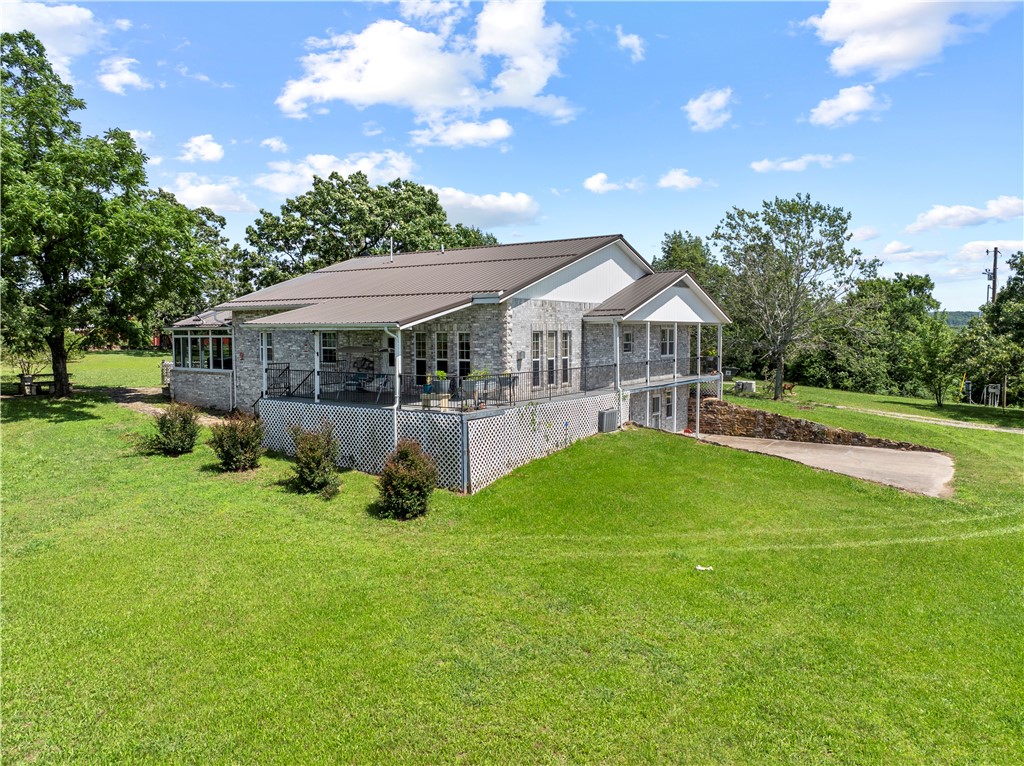 Looking for privacy, beauty & room to roam, this 80 acre horse farm offers all the perfect blend. This property features a sprawling 3544 sqft all brick home, thoughtfully designed across two levels. Inside you will find 4 bed/3 bath with a cozy sun room. Ex-large kitchen is a true centerpiece, complete with granite countertops, custom oak cabinetry & flooring that flows throughout the home. It also offers a whole home generator, central vacuum system, a fireplace and composite decking.
For the horse enthusiast there's a 6-stall horse barn with tack room, multiple paddocks, hay fields, fenced & crossed fenced pastures, all designed for ease of care and happy horses. There are also hay barns, 5-car garage, garden house and a hen house complete with water & electricity for your feathered friends.
Nature lovers & anglers alike will enjoy two large, stocked ponds filled with bluegill, catfish and largemouth bass, complete with dock and a gazebo for fishing.
Come & experience the charm, space & serenity of this one!