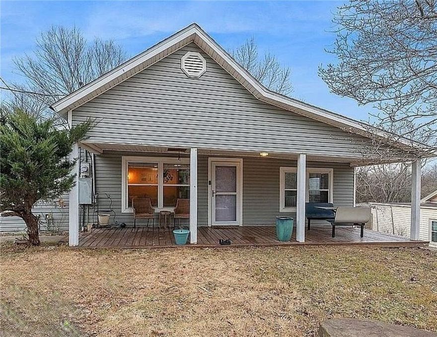 Charming cottage on 2.7 scenic acres just minutes from Mission and Crossover, offering the perfect mix of comfort and opportunity. This 3-bedroom, 1-bath home features a spacious kitchen, hardwood floors, and numerous updates, with potential to convert to a 3-bedroom, 2-bath layout. Enjoy a covered front porch, beautiful landscaping, and a large fenced backyard ideal for relaxing or entertaining. The property also includes an 18' x 18' shop and a storage shed for added versatility. A great option for those looking to build—live in the home while constructing your dream house, then use it as a rental. Conveniently located less than half a mile from Happy Hollow Elementary, this property offers space, flexibility, and long-term value.