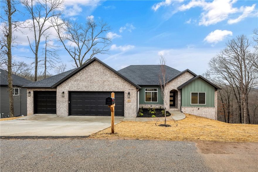 Construction is complete! Beautiful new construction by Elite Thomas Homes on a spacious double lot on Bella Vista’s west side, offering ample room for a future shop or detached garage. 
This thoughtfully designed floor plan includes 4 bedrooms plus a dedicated office and an oversized 3-car garage. Enjoy an open concept living area with an L-shaped kitchen and a walk-in pantry. There is wood flooring throughout the main level and premium upgraded carpet on the stairs and in the basement. The primary bath features a dual vanity, tiled shower, and freestanding tub for a spa-like retreat. The lower level includes a media/game room with a wet bar, ideal for entertaining. Enjoy outdoor living with two covered decks—one off the kitchen and a second accessible from the lower level. Contact me for a current list of finishes and available upgrades.