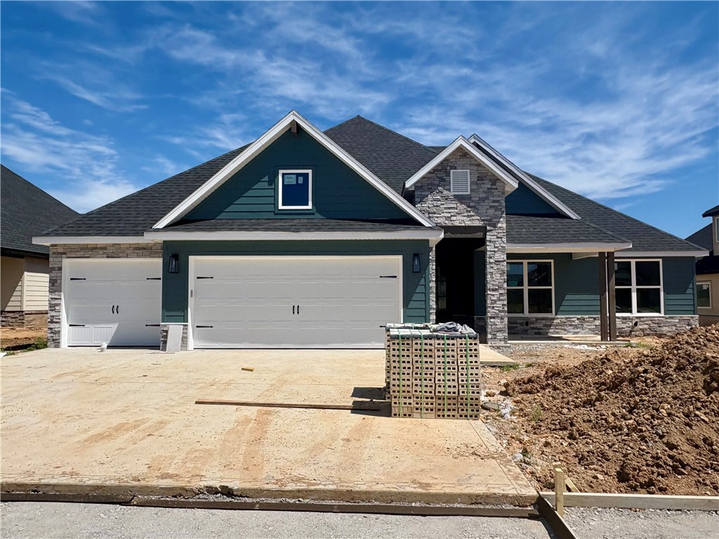 Welcome to Maple Estates in Centerton, Arkansas—a beautifully situated community just minutes from Bentonville’s West High School Campus, with convenient access to shopping, entertainment, and recreation. This prime location offers the perfect balance of town proximity and peaceful living. Introducing the Kingsley plan, a spacious 2,610 sq ft home designed with comfort and functionality in mind. This thoughtfully laid-out floor plan features 3 bedrooms, 2.5 bathrooms, and a private study at the front of the home, ideal for remote work or quiet reading. The open-concept kitchen and living area create a welcoming space for entertaining or family gatherings. Additional highlights include a three-car garage and a covered back patio with a cozy outdoor fireplace—perfect for relaxing evenings at home. Experience the best of modern living in a serene and convenient setting.