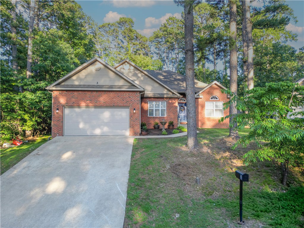 Welcome to 3 Burford Lane, where charm, space, and updates come together—with an additional 0.40-acre lot included to stretch out or dream big. Inside, you’ll find an open, airy floorplan with vaulted ceilings, a split-bedroom layout with, and warm details throughout, like wood flooring, custom ceiling tiles, and a fireplace topped with a reclaimed 1880s mantel from St. Louis. The kitchen is both functional and inviting, featuring Silestone counters, a double oven, and plenty of room to gather. The primary bedroom has 2 walk-In closets. Big updates are already taken care of—2021 Trane HVAC, water heater, and smart home upgrades like Nest and Ecobee. All this, just minutes from the Back 40 Trails, Lake Ann, and everything Bella Vista has to offer.