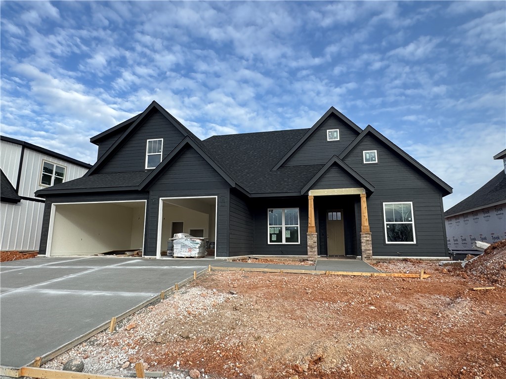 Another quality new construction home is available in the desired Crescent View Subdivision! This home boasts 4 bedrooms, 3 bathrooms, bonus room, 3 car garage, and a great layout. Kitchen is equipped with gas cooktop, built-in oven & microwave, large island with waterfall granite, & eat-in dining area that is all open to the living room. Downstairs has the office, primary suite and BR 2. Bedrooms 3-4, bonus room and a full bathroom are all upstairs. Enjoy grilling or hanging out on the covered back patio. Located steps from Janie Darr Elementary and the new Mt Hebron Park. Subdivision is close to XNA, I-49, shopping, dining, and entertainment.