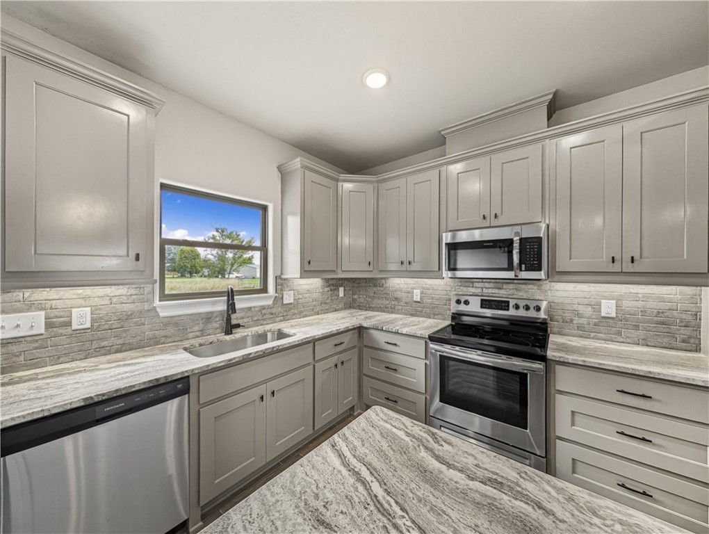 Welcome To Your Next Home! Don't Settle For A Basic Home That Offers You Nothing When You Can Have This Loaded Up 3 Bedroom On A Huge 0.44 Acres Lot. Custom Cabinets And Granite Counters. Woodlook Tile In Main Living Areas, Tile In Laundry/Baths, Carpet In Beds. Split Floorplan. Primary Suite With Tile Shower And Dual Vanity In Primary Bath. Back Patio Area. Wrapping Up In Less Than 60 Days. Come See!