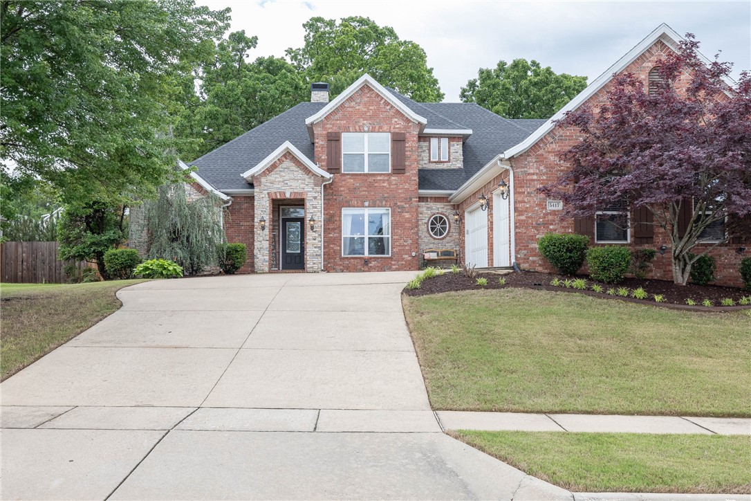 This is a stunning home located in the well-established subdivision of Legacy Estates! This house features a beautiful split floor plan with an eat-in kitchen, formal dining room, and living room with a cozy gas fireplace. It can be a 5 bedroom, 3.5-bathroom or a 4-bedroom with a bonus room. There are two attics upstairs, providing ample storage space. The primary bathroom is gorgeous, with a soaker tub and a walk-in shower, and there are large walk-in closets in every bedroom. The upstairs bedrooms have a jack-and-jill bathroom with a shared shower/tub. The house also features a new tankless water heater installed in 2022 and a new roof installed in 2020. There is a sprinkler system in the front and back of the house, and two covered patios are perfect for outdoor entertainment. The home has a security system available, with a privacy fence. Near shopping and the Razorback Greenway trails! Don't wait to make this stunning home yours - schedule a showing today!