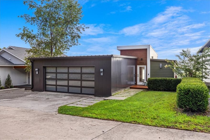 This incredible, modern lake house sits on two combined quarter-acre lots with what might be the best view on Beaver Lake!

With 4,000+ square feet across three stories, this home was built into the hillside to take full advantage of the view. Inside you’ll find 3 oversized bedrooms, 5 full bathrooms, a home office, multiple living areas, and windows that flood every level with natural light.

he layout is unique by design—built to work with the slope of the land and make the most of the view. It’s functional, intentional, and anything but cookie-cutter.

Back on the market and made for slow mornings, long weekends, and lake days that linger a little longer. Whether you're hosting a houseful or enjoying the quiet, there's space to stretch out and take it all in. This one was built for the kind of life you don’t need a vacation from. Schedule your showing today!