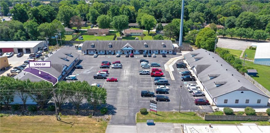 This prime 1,000 SF retail/office suite at Kingston Centre offers exceptional visibility in a high-performing Bentonville plaza located just off N Walton Blvd, one of the city’s most traveled corridors with over 20,000 vehicles per day. The property provides unmatched accessibility with expansive on-site parking that ensures smooth customer flow, complemented by a dynamic tenant mix including McClure Fitness, Shelter Insurance, Outbound Waste, Onyx & Gold Beauty Lounge, and Limitless Chiropractic—creating strong daily traffic and a built-in customer base. Strategically positioned just minutes from key demand drivers—1.7 miles to the Bentonville Square, 2.3 miles to I-49, and 2.9 miles to the new Walmart Global Campus—this suite is ideal for retailers, boutique service providers, and professional office users seeking a high-visibility, high-traffic location in one of Northwest Arkansas’ most desirable trade areas.