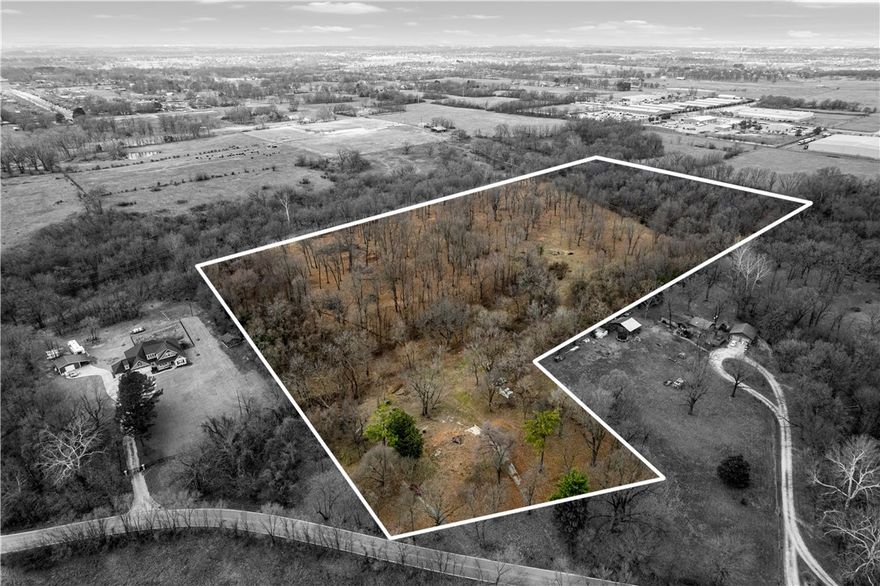 21 acres of beautiful land and opportunity to make this your dream home or investment. Developers this is prime site for a subdivision. Centrally located in NWA, minutes from shopping, hospitals, entertainment, airport, and I49. Utilities on site