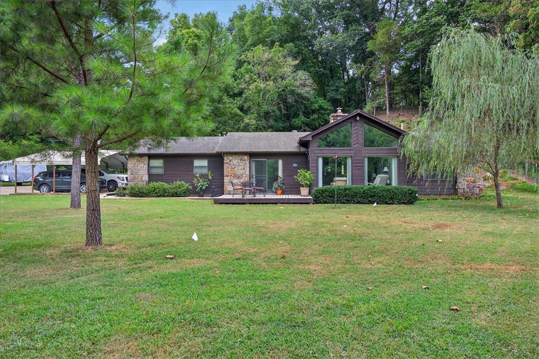 Great Mini Farm only 3 miles from town! With Spring and wet weather creek, 3 bedroom 2 bath home on 5.05 acres. 2 car garage with detached 24 x 36 shop and a 28 x 10 pole shed. Great for horses, chickens, Beautiful park like setting, Close to town on paved road. Furnace heat pump with backup propane replaced in 2021 A/C new in 2009, Hot water tank replaced in 2020, roof replaced in 2015, carpet replaced in 2013, all ducts cleaned professionally in 2021. Well maintained home in a beautiful area.