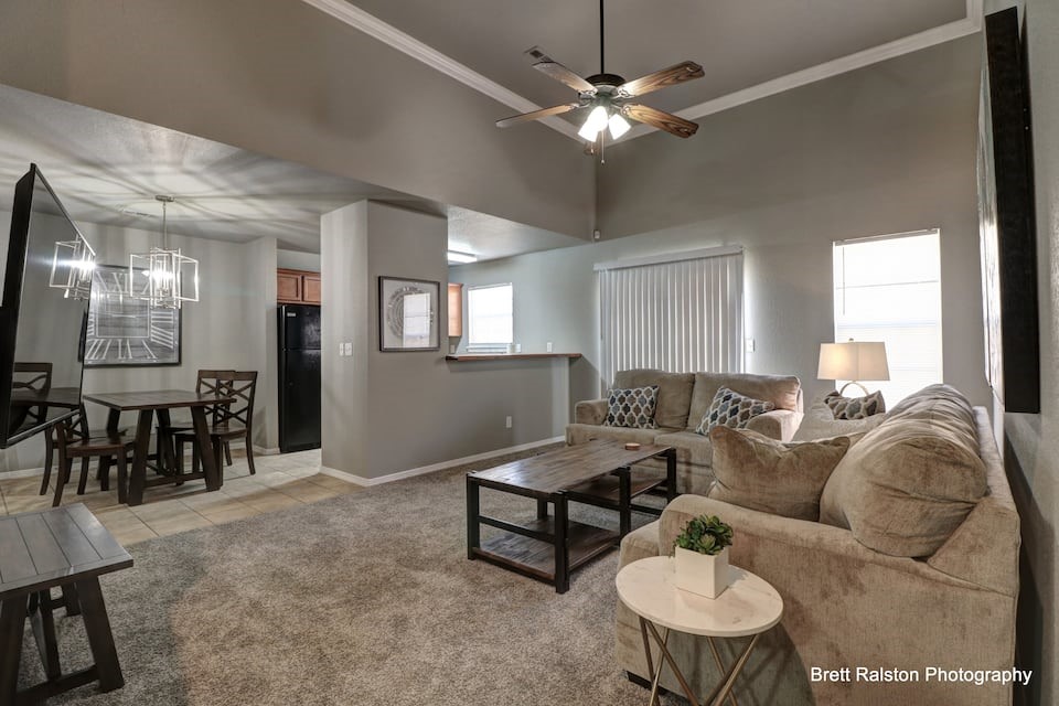 Vaulted ceilings Remodeled, 3 bedroom, 2 bath condos located a mile from the U of A and Neighboring the trail. Clean and modern with high ceilings, crown molding, wood burning fireplace. The 3 buildings in this section are all being updated on exterior as well. Investors more to come ask about other units located at Breeze Cove.
